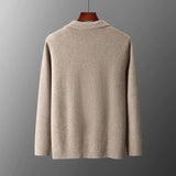 Beige women's lightweight casual linen blazer with a collarless open front design, displayed on a clothes hanger.
