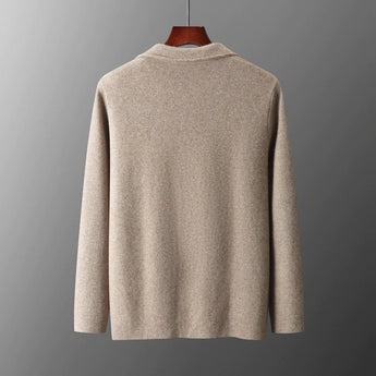Beige women's lightweight casual linen blazer with a collarless open front design, displayed on a clothes hanger.