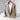 Beige women's lightweight casual linen blazer with a collarless open front design, featuring long sleeves and a tailored fit suitable for fashion-conscious individuals seeking stylish outerwear.