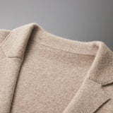 Beige women's lightweight casual linen blazer with a collarless open front design, featuring long sleeves and a stylish pattern.