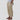 Beige women's linen pants in size 3XL, featuring an elastic waist. The pants are lightweight and sustainable, shown in a casual yet stylish fashion setting.