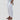 Women's white linen pants in size 3XL, featuring an elastic waist, lightweight and sustainable material, shown in a formal wear setting.