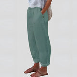 Dark green women's linen pants with an elastic waist, displayed in a 3XL size.