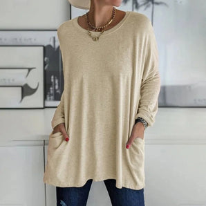 A beige women's long sleeve tunic top with pockets, featuring a casual and oversized fit. The top is in a khaki color and available in size 5XL.