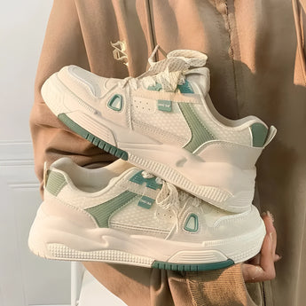 Beige women's low-top fashion sneakers crafted from textured fabric with a durable sole, shown in green color for size 40.