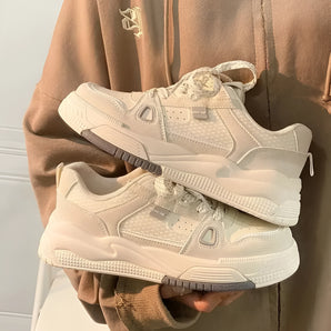 Beige women's low-top fashion sneakers with textured fabric and durable sole, shown in size 40.