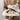 Beige women's low-top fashion sneakers with textured fabric and durable sole, shown in Nero color, size 40.