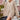 Beige women's oversized batwing poncho sweater in khaki, size XL, displayed on a mannequin against a white backdrop. The sweater features a wide neckline and loose fit, suitable for fall fashion.