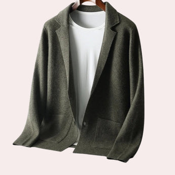 Olive green oversized wool blazer for women, featuring a notch lapel, long sleeves, and a classic collar, styled for autumn wear.
