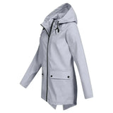 Beige women's waterproof hooded raincoat, lightweight and stylish with a tailored design, featuring long sleeves and a comfortable fit.