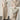 Beige wool blend sleeveless turtleneck sweater for women, showcasing winter fashion with a soft and cozy design, featuring a high neck and tailored fit.