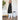 Black XXL women's long coat made from a beige wool blend, featuring a minimalist design suitable for winter fashion. The coat includes long sleeves and is styled with a focus on the waist, providing a chic and elegant appearance.