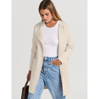 Beige wool blend women's long coat in cream, styled for minimalist winter fashion, featuring long sleeves, a tailored collar, and a flattering waistline in XXL size.