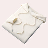 Beige wool cowl neck sweater for women with long sleeves, designed for winter wear.