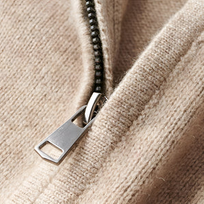 Beige wool zipper sweater with a stylish textured pattern, featuring a collar and designed as a winter jacket.