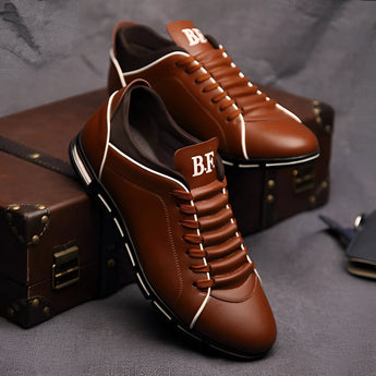 Men's brown leather dress shoes in a stylish pointed loafer design, size 47.