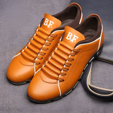Men's red leather dress shoes in a stylish pointed loafer design with an orange hue, showcasing a sophisticated and elegant appearance.