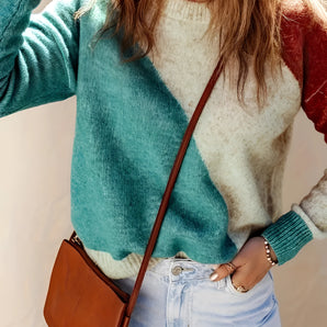 Bi-color women's sweater featuring a green and cream two-tone design. The sweater is winter knit with long sleeves, shoulder detail, and a rounded neck.
