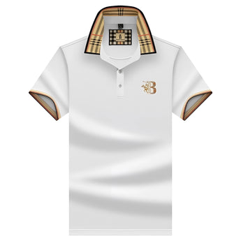 A black designer polo shirt featuring a plaid collar and a gold crest on the chest, displayed in a white 3XL variant.