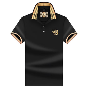 Black designer polo shirt with plaid collar and gold crest, size 3XL.