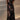 Black floral sheer one-shoulder evening dress in XXL size, featuring a delicate floral pattern and a sheer overlay. The dress is styled with an elegant one-shoulder design, showcasing the waist and thigh area.
