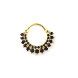 Luxury hoop earrings made of gold featuring black teardrop gemstone charms.