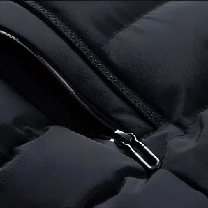 Glossy black quilted leather jacket with a luxurious design, featuring long sleeves and a sleek, modern silhouette.