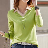 Black and green V-neck blouse featuring long sleeves and a stylish design, suitable for both office and casual wear.