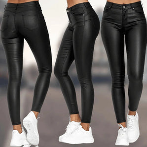 Black high-waisted vegan leather skinny pants on a female model showcasing a slim fit design, with focus on the legs and fashion-forward style.