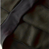 
A black hoodie with a soft texture and comfortable fit, featuring durable fabric and deep pockets, displayed with visible sleeves and a collar.