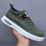 Men's black lace-up low-top sneakers in a green color variant, size 47, showcasing a fashionable and comfortable design suitable for outdoor and athletic activities.
