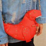 Black leather horse-shaped crossbody bag with gold chain strap, featuring a unique and artistic design.