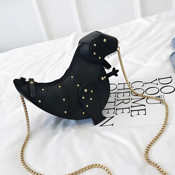 Black leather horse-shaped crossbody bag featuring a gold chain strap, designed as a fashion accessory.