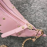 Black leather horse-shaped crossbody bag with a gold chain strap.