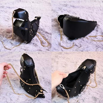 Black leather horse-shaped crossbody bag with a gold chain strap.