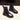 Black leather insulated combat boots with fur lining and rugged soles, featuring steel-toe protection, suitable for work environments.