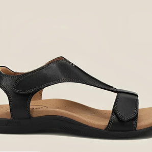Black leather women's orthopedic sandals featuring a cork footbed, adjustable straps, and a comfortable design.