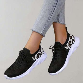 Black leopard print women's stylish sneakers in size 42.5, featuring a comfortable design suitable for walking and sportswear.