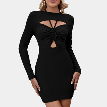 
A woman wearing a black long sleeve cut-out bodycon mini dress, suitable for party wear, showcasing the shoulder and arm cut-out design, while smiling.