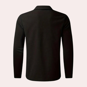 Men's black slim fit textured dress shirt featuring a sharp collar, long sleeves, and buttons, ideal for elegant formalwear occasions.