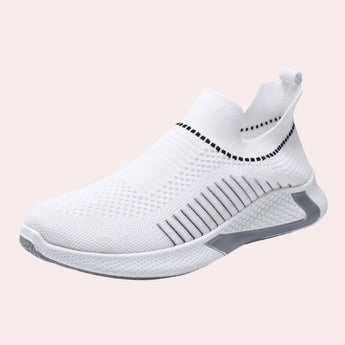 Black men's slip-on sneakers featuring breathable mesh material, red accents, and a flexible sole, designed for athletic and casual wear.