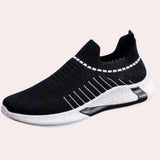Black men's slip-on sneakers featuring a breathable mesh upper with red accents, flexible sole, and a black and white color scheme in size 45, suitable for walking and outdoor activities.