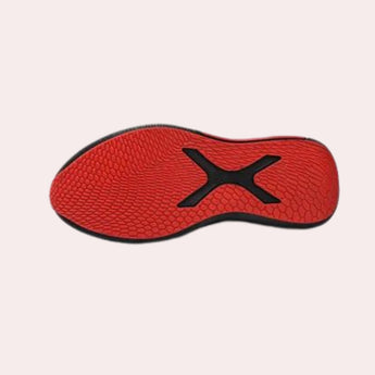 A pair of black men's slip-on sneakers featuring breathable mesh material with red accents and a flexible sole, designed for comfort and style.