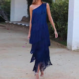 Elegant blue off-shoulder evening gown with tiered fringe detailing, showcasing luxurious design and fashion-forward style, suitable for formal occasions.