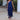 Elegant blue off-shoulder evening gown with tiered fringe detailing, showcasing luxurious design and fashion-forward style, suitable for formal occasions.