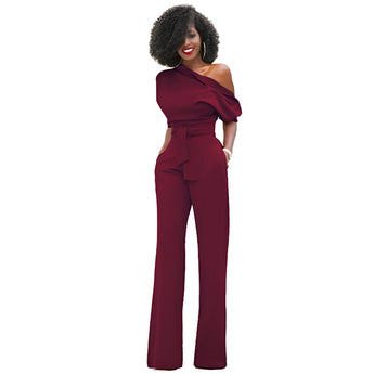 Elegant wine red one-shoulder belted jumpsuit in size 2XL, featuring an asymmetrical sleeve design and cinched waist, perfect for formal evening wear.