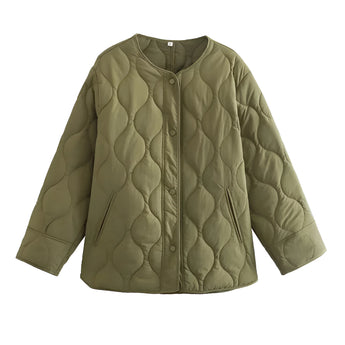 Women's lightweight urban puffer jacket in light green, featuring an oversized quilted design with long sleeves and a collar.