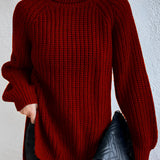 
A woman's red oversized ribbed turtleneck sweater, designed for cozy winter wear, showcasing a comfortable fit with long sleeves and a soft knit texture.