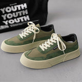 Black platform fashion sneakers with a textured sole, ankle-height design, and green accents, size 47.