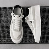 Black platform fashion sneakers with a textured sole, ankle-height design, in a Wit colorway, size 47.